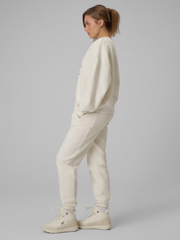 Damskie spodnie dresowe joggery 4F 4FRSS26TTROF1724 - beżowe