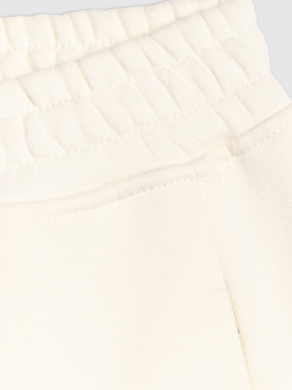 Damskie spodnie dresowe joggery 4F 4FRSS26TTROF1724 - beżowe