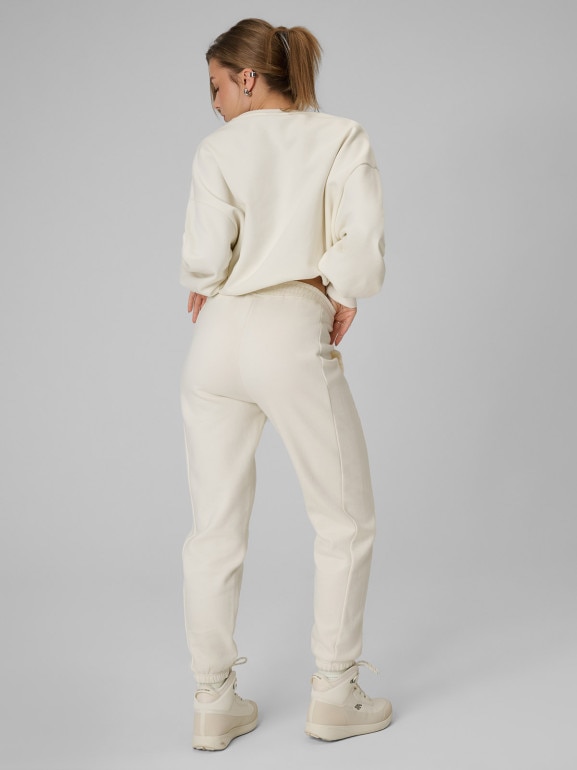 Damskie spodnie dresowe joggery 4F 4FRSS26TTROF1724 - beżowe