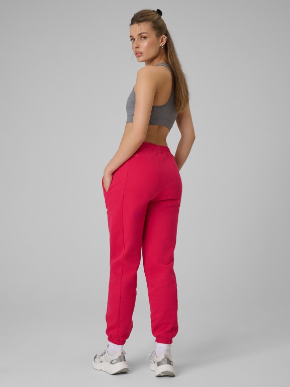 Damskie spodnie dresowe joggery 4F 4FRSS26TTROF1724 - czerwone