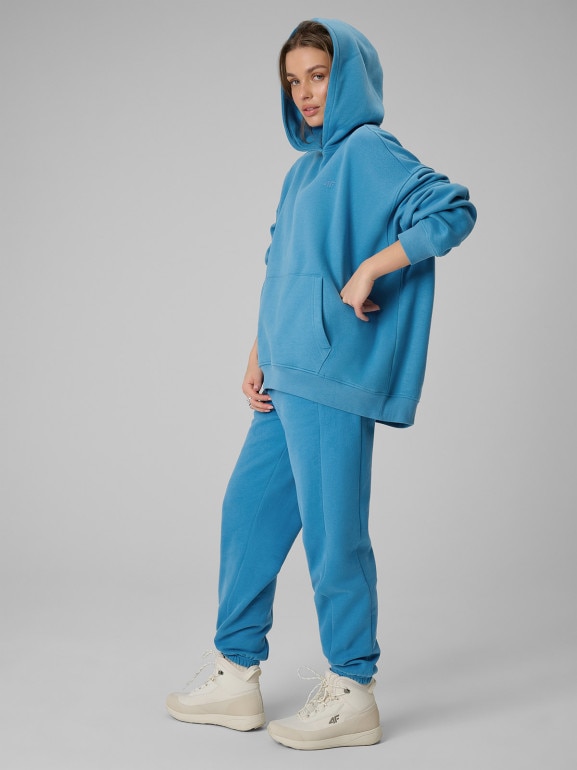 Damskie spodnie dresowe joggery 4F 4FRSS26TTROF1724 - niebieskie