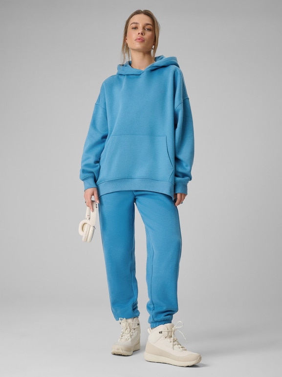 Damskie spodnie dresowe joggery 4F 4FRSS26TTROF1724 - niebieskie