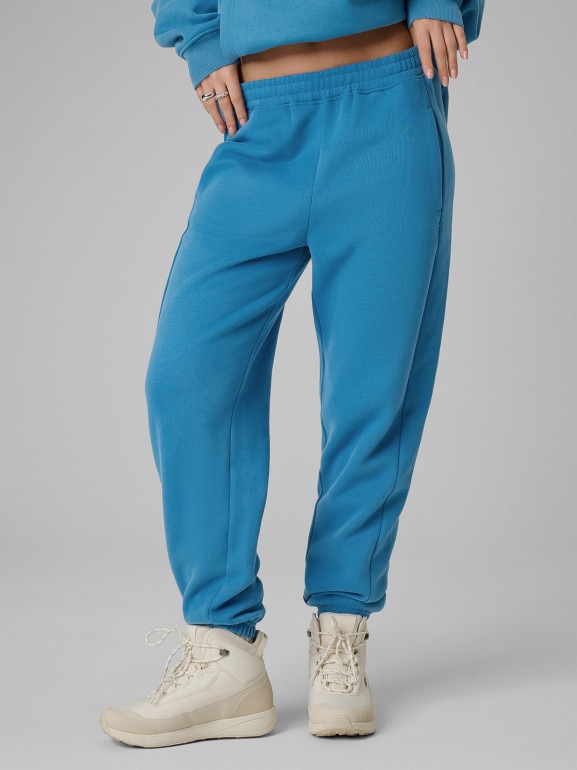 Damskie spodnie dresowe joggery 4F 4FRSS26TTROF1724 - niebieskie