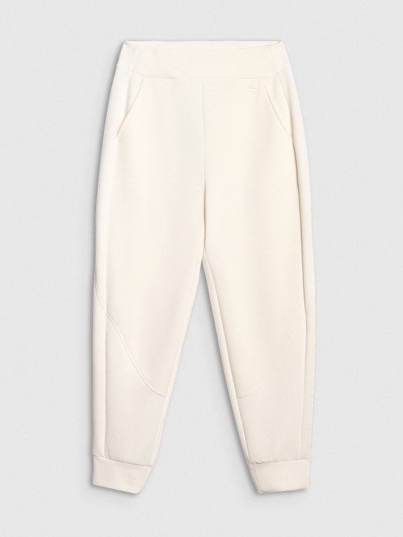 Damskie spodnie dresowe joggery 4F 4FWAW25TTROF1180 - białe