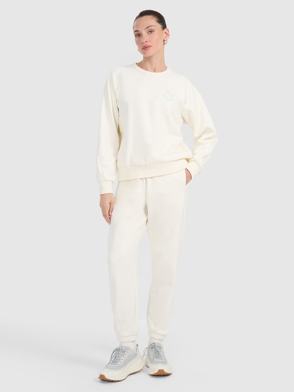 Damskie spodnie dresowe joggery 4F 4FWAW25TTROF1185 - białe