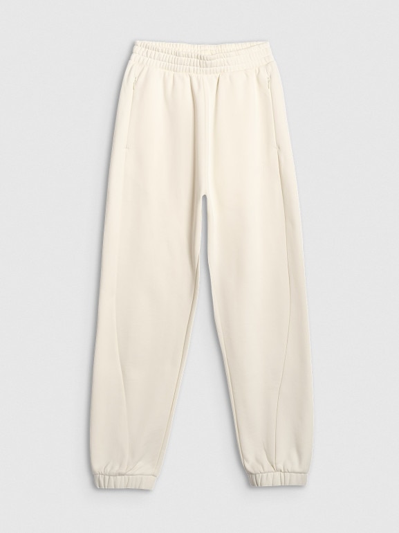 Damskie spodnie dresowe joggery 4F 4FWAW25TTROF1185 - białe