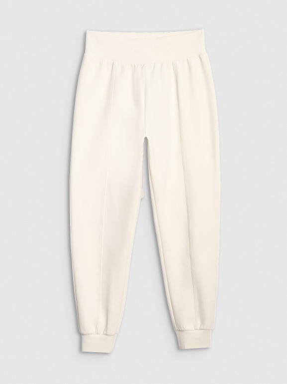 Damskie spodnie dresowe joggery 4F 4FWAW25TTROF1196 - beżowe