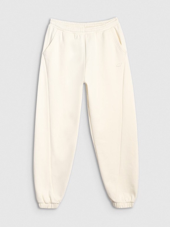 Damskie spodnie dresowe joggery 4F 4FWAW25TTROF1205 - beżowe