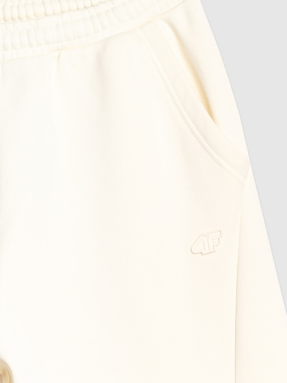 Damskie spodnie dresowe joggery 4F 4FWAW25TTROF1205 - beżowe