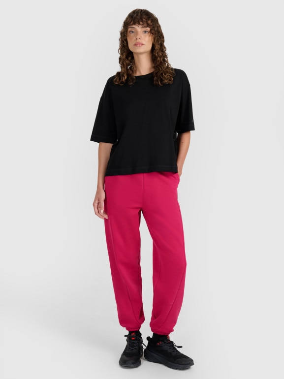 Damskie spodnie dresowe joggery 4F 4FWAW25TTROF1205 - różowe