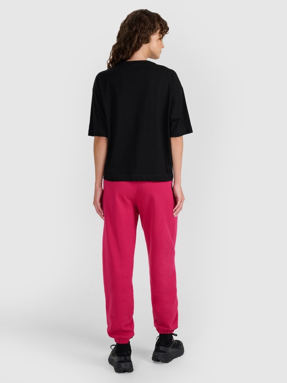 Damskie spodnie dresowe joggery 4F 4FWAW25TTROF1205 - różowe