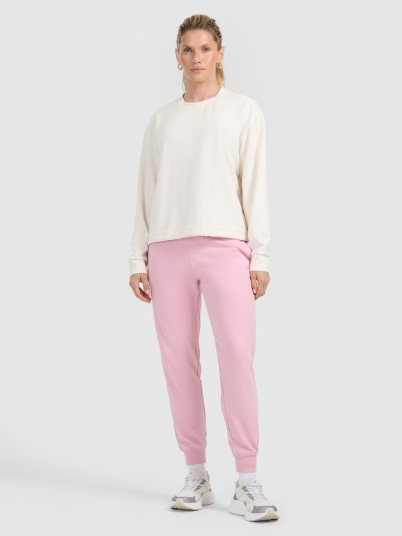 Damskie spodnie dresowe joggery 4F 4FWMM00TTROF0945 - różowe