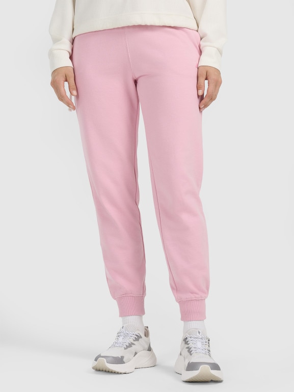 Damskie spodnie dresowe joggery 4F 4FWMM00TTROF0945 - różowe