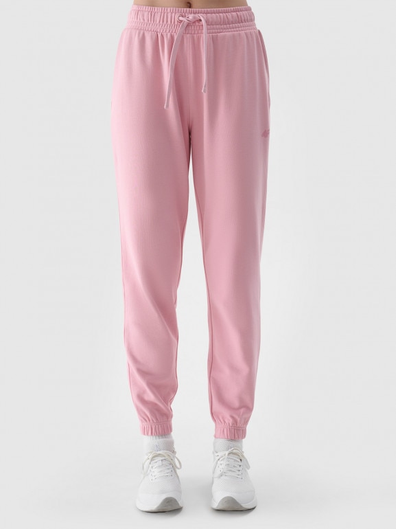 Damskie spodnie dresowe joggery 4F 4FWMM00TTROF1138 - różowe 