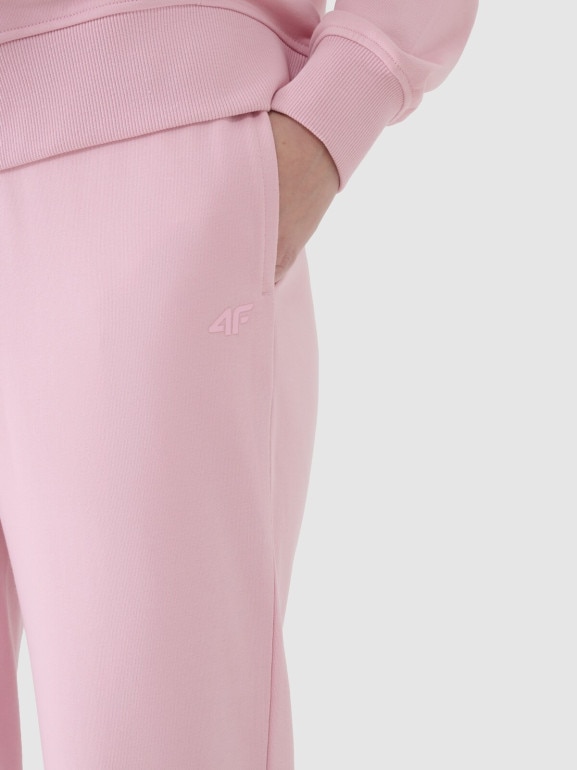 Damskie spodnie dresowe joggery 4F 4FWMM00TTROF1386 - różowe