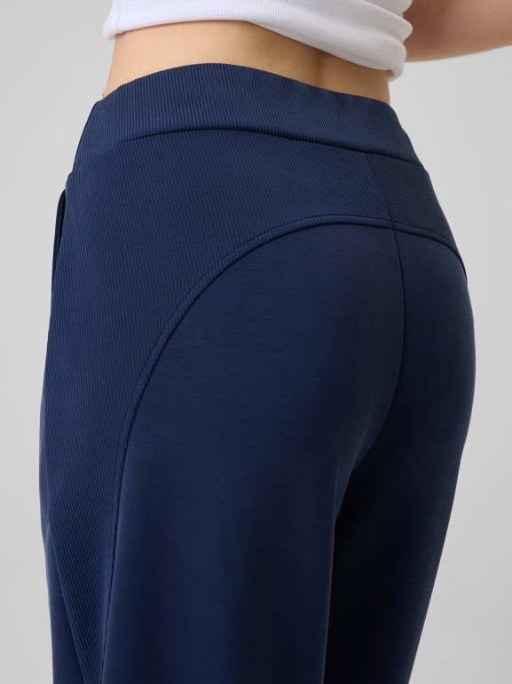 Damskie spodnie dresowe joggery 4F 4FWSS26TTROF1410 - granatowe