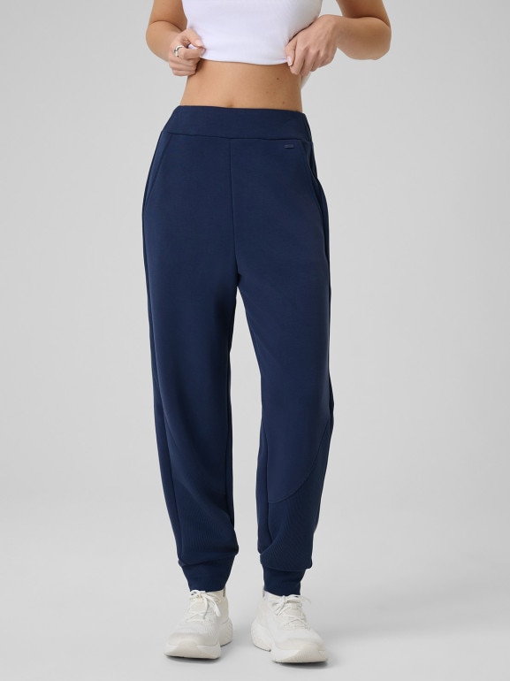 Damskie spodnie dresowe joggery 4F 4FWSS26TTROF1410 - granatowe