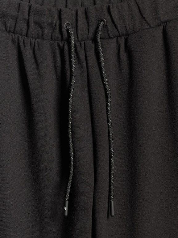 Damskie spodnie dresowe joggery 4F 4FWSS26TTROF1412 - czarne