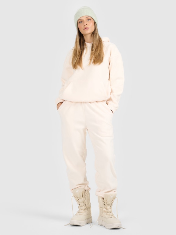 Damskie spodnie dresowe joggery polarowe 4F 4FRAW25TTROF1707 - białe 