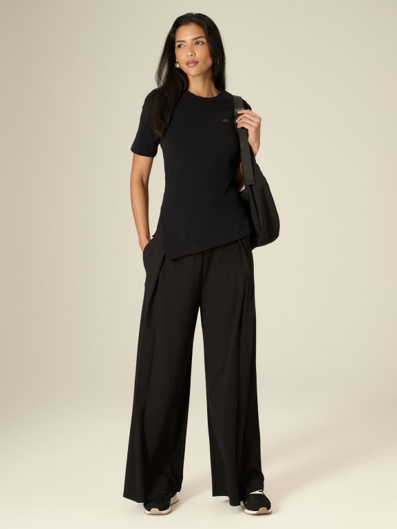Damskie spodnie dresowe z szerokimi nogawkami 4F 4FRSS26TTROF1925 - czarne