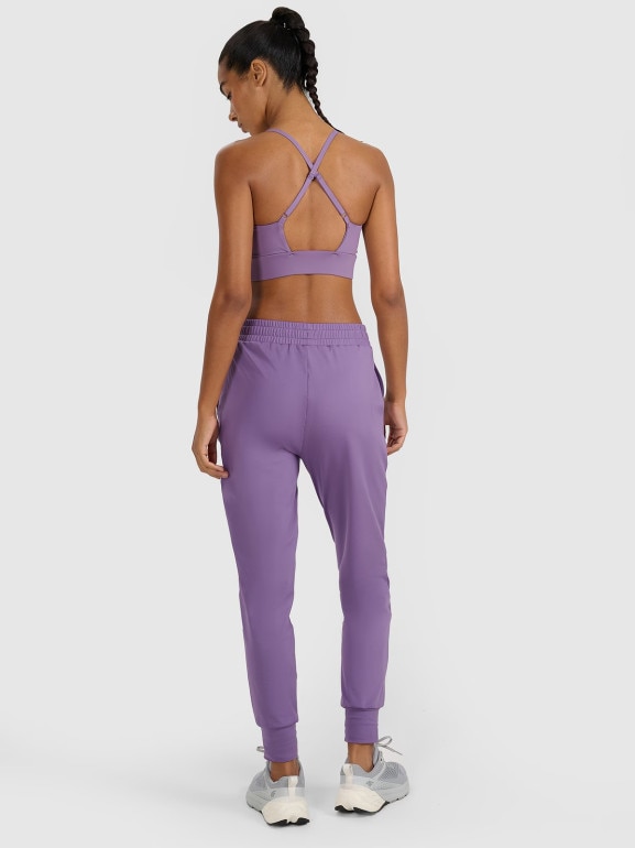 Damskie spodnie treningowe 4F 4FWAW25TFTRF0934 - fioletowe