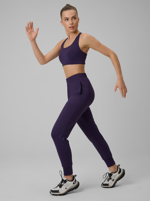 Damskie spodnie treningowe 4F 4FWSS26TFTRF1074 - fioletowe