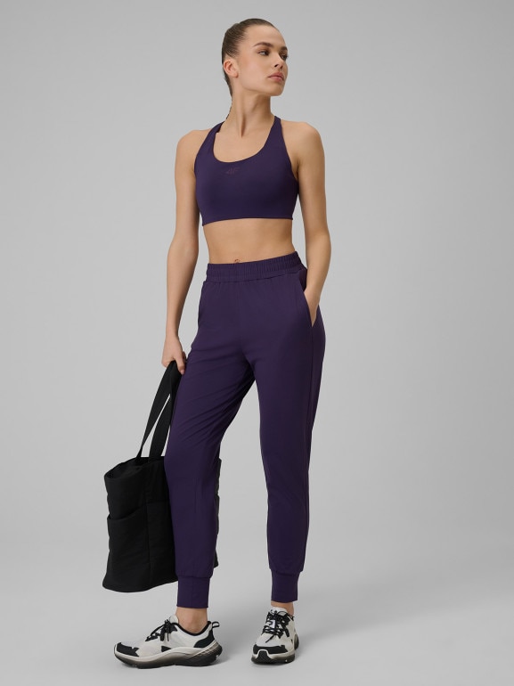 Damskie spodnie treningowe 4F 4FWSS26TFTRF1074 - fioletowe