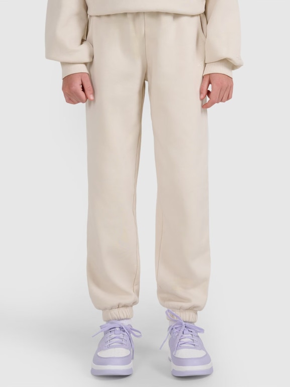 Dziewczęce spodnie dresowe joggery 4F 4FJRAW25TTROF1473 - białe