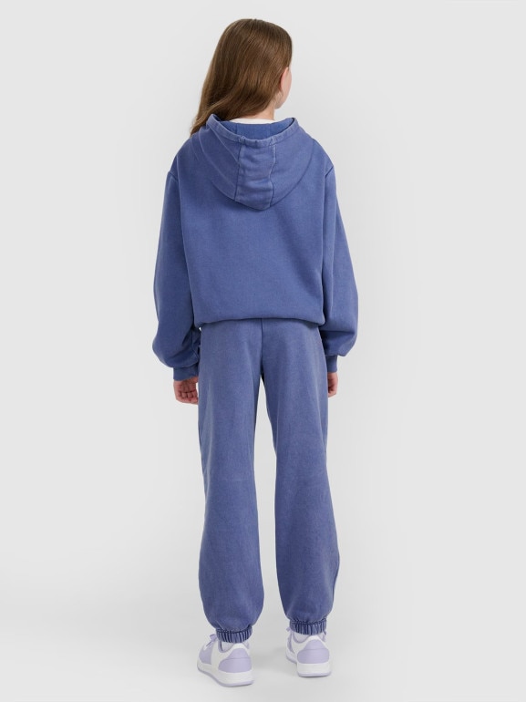 Dziewczęce spodnie dresowe joggery 4F 4FJRAW25TTROF1473 - niebieskie