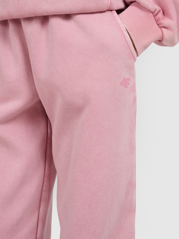Dziewczęce spodnie dresowe joggery 4F 4FJRAW25TTROF1473 - różowe