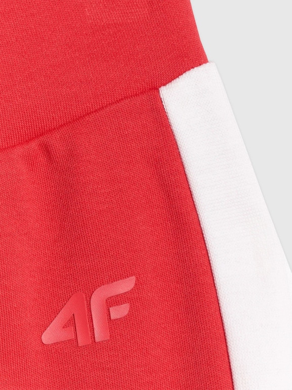 Dziewczęce spodnie dresowe 4F 4FJRAW25TTROF1599 - czerwone