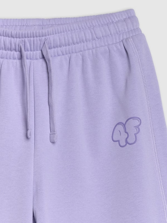 Dziewczęce spodnie dresowe 4F 4FJRAW25TTROF1601 - fioletowe