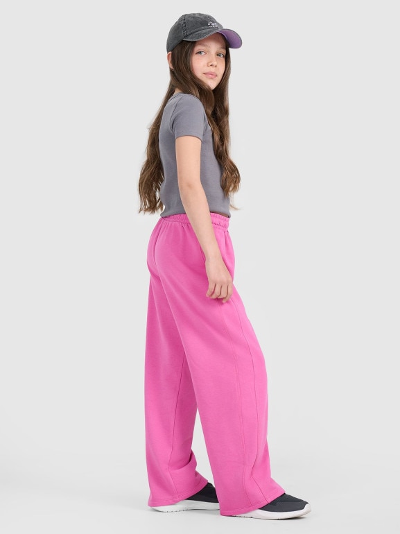 Dziewczęce spodnie dresowe 4F 4FJRAW25TTROF1601 - różowe