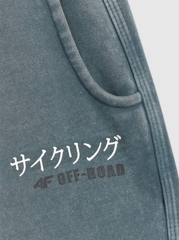 Chłopięce spodnie dresowe joggery 4F 4FJRAW25TTROM1528 - turkusowe