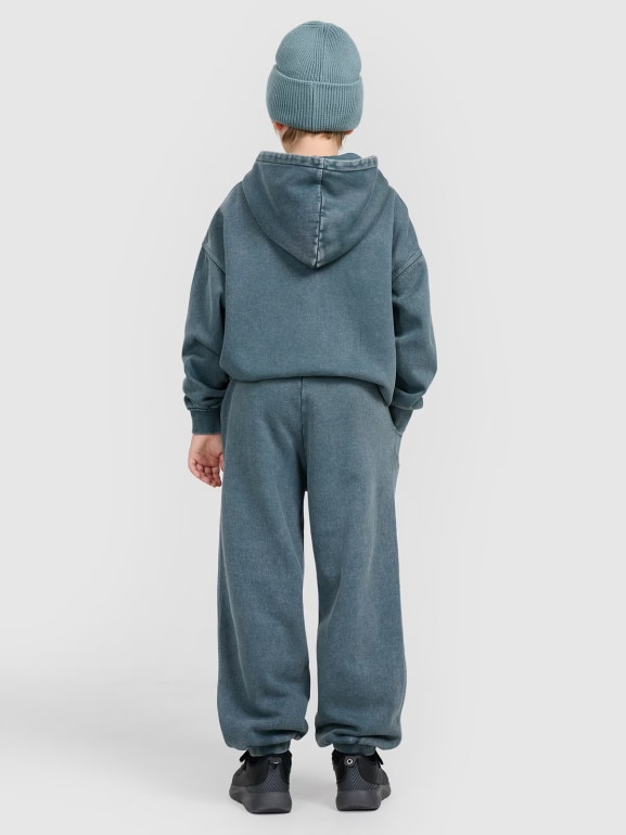 Chłopięce spodnie dresowe joggery 4F 4FJRAW25TTROM1528 - turkusowe