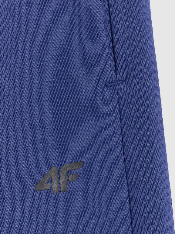 Chłopięce spodnie dresowe joggery 4F 4FJRAW25TTROM1578 - granatowe