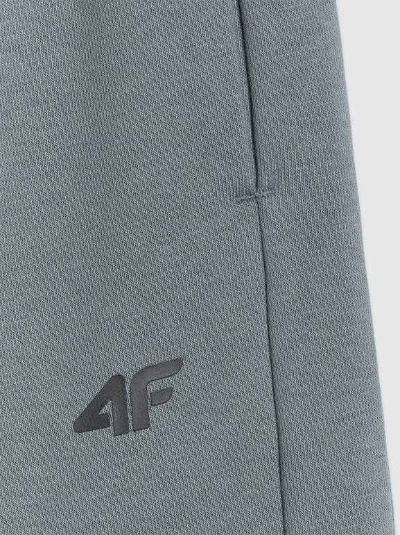 Chłopięce spodnie dresowe joggery 4F 4FJRAW25TTROM1578 - turkusowe