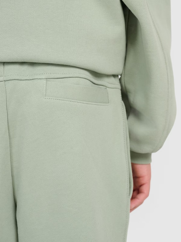 Chłopięce spodnie dresowe joggery 4F 4FJRAW25TTROM1605 - oliwkowe