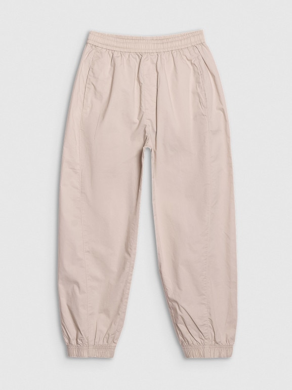 Dziewczęca spodnie dresowe joggery 4F 4FJRSS25TTROF1465 - beżowe
