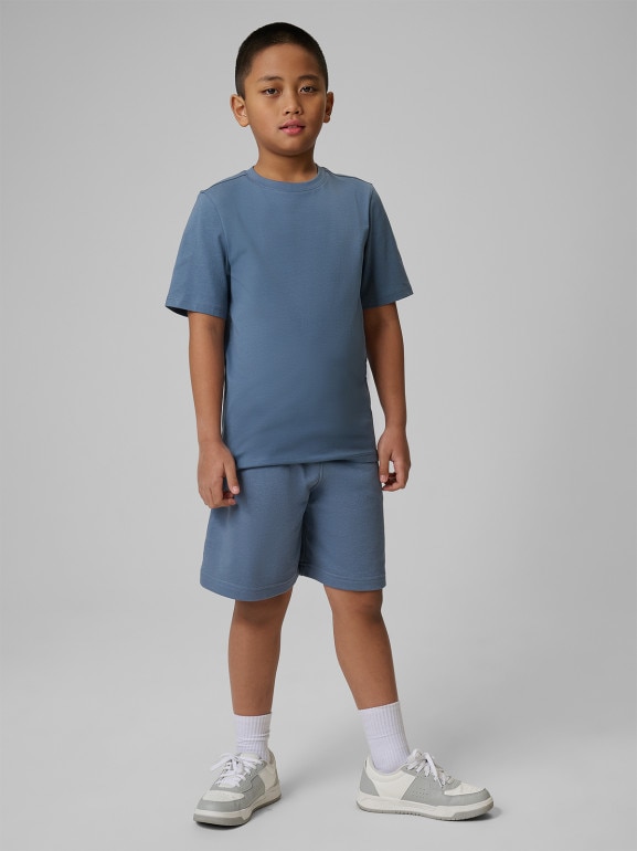 Chłopięce spodenki dresowe 4F 4FJRSS26TSHOM0866 - denim