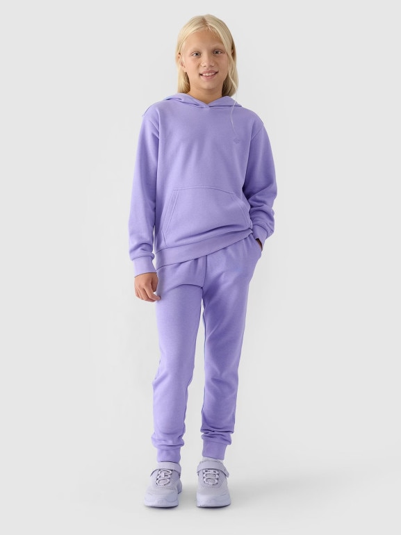Dziewczęce spodnie dresowe joggery 4F 4FJWMM00TTROF0829-27M - fioletowe