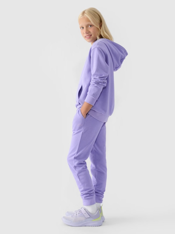Dziewczęce spodnie dresowe joggery 4F 4FJWMM00TTROF0829-27M - fioletowe