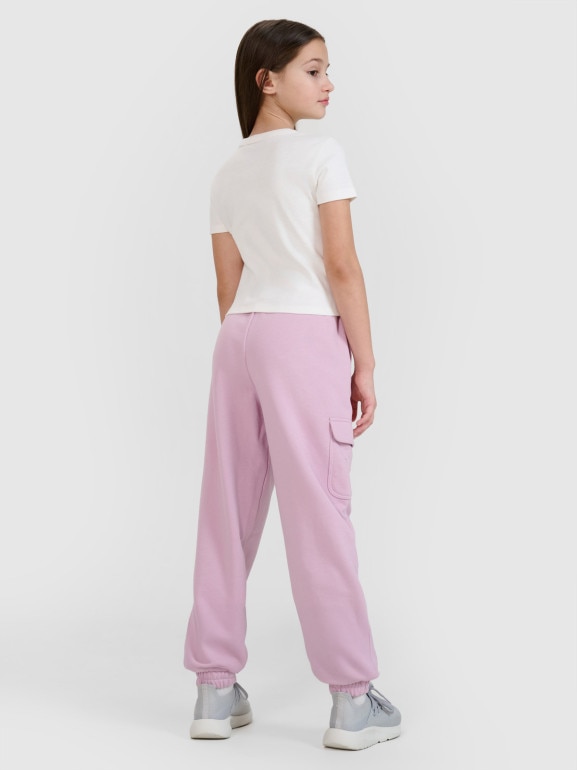 Dziewczęce spodnie dresowe joggery 4F 4FJWSS25TTROF1135 - różowe