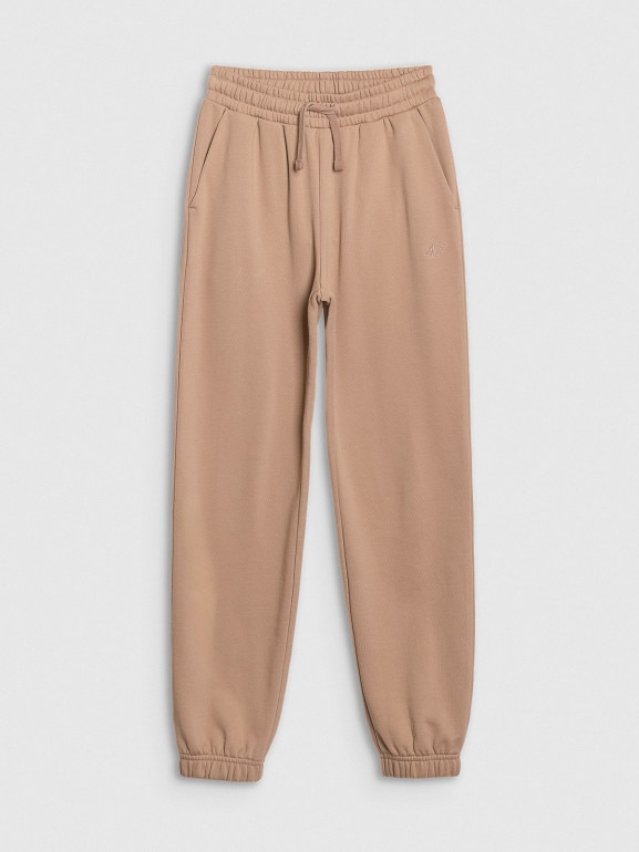 Dziewczęce spodnie dresowe joggery 4F 4FJWSS25TTROF1187 - beżowe