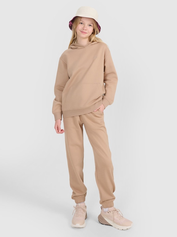 Dziewczęce spodnie dresowe joggery 4F 4FJWSS25TTROF1187 - beżowe