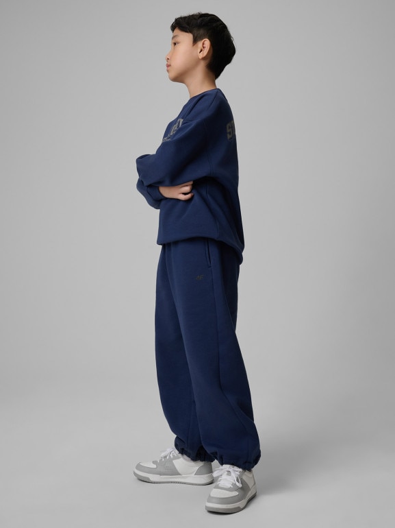 Chłopięce spodnie dresowe 4F 4FJRSS26TTROM1731 - granatowe