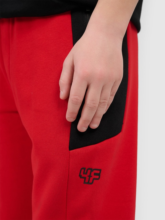 Chłopięce spodnie dresowe 4F 4FJRSS26TTROM1874 - czerwone