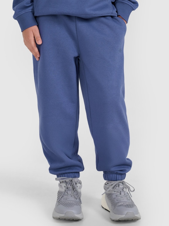 Chłopięce spodnie dresowe joggery 4F 4FJRAW25TTROM1634 - niebieskie