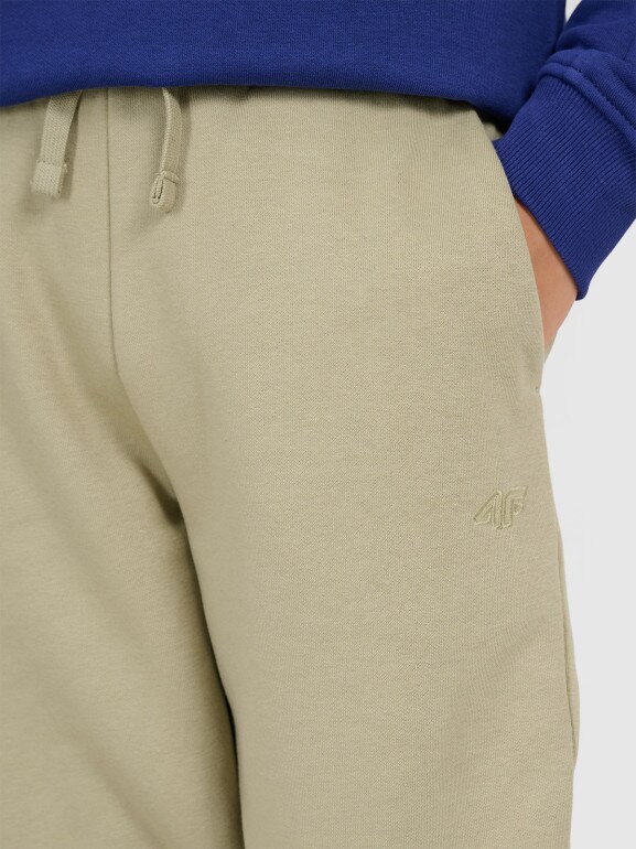 Chłopięce spodnie dresowe joggery 4F 4FJRAW25TTROM1634 - zielone