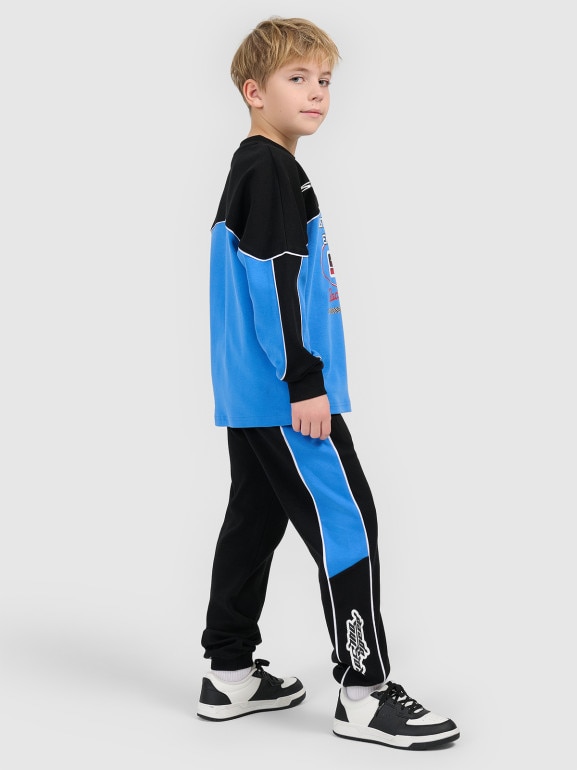 Chłopięce spodnie dresowe joggery 4F 4FJRSS26TTROM1873 - czarne